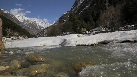 River flowing and snow mountain in gangotri Stock Footage 203101471