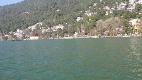River Flowing Between Mountains and Lifestyle Stock Footage 337628022