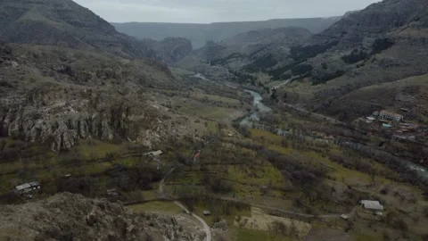 River Flowing Between Mountains Stock Footage 177523650