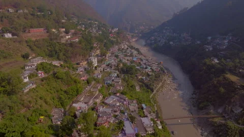 River flowing between the town at hill station Stock Footage 278351332
