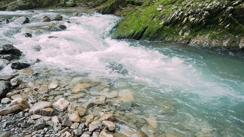 The river flowing into the canyon Stock Footage 89807297