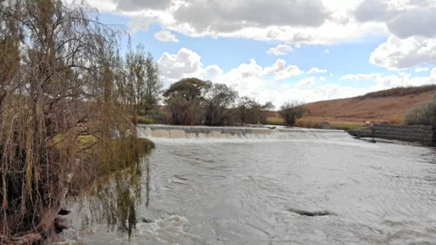 A river flowing downstream Stock Footage 288211648