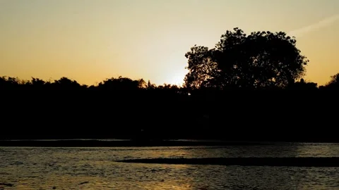 River flowing during sun set Stock Footage 259317693