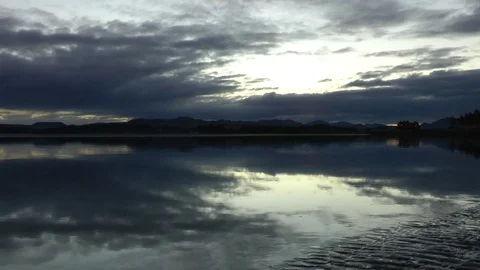 River flowing at dusk Stock Footage 83567296