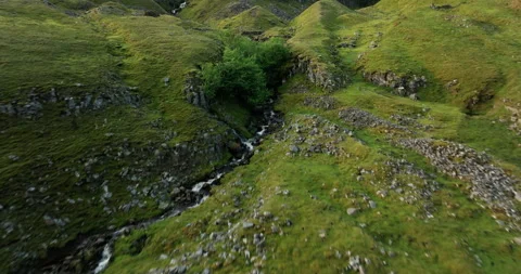River flowing on the hill Stock Footage 312407447