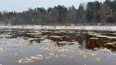 River with Flowing Ice in 4K Stock Footage 297998707