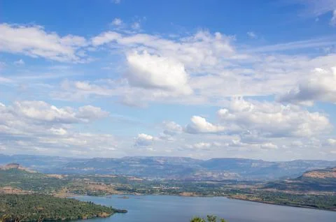 River flowing in middle of hills 스톡 사진