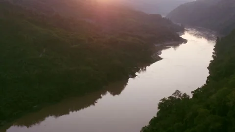 River flowing next to a forest aerial Stock Footage 279018646