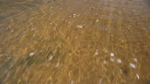 River flowing over beach into sea Stock Footage 158181187