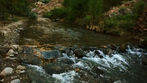 River flowing over rocks and boulders. Stock Footage 88406509
