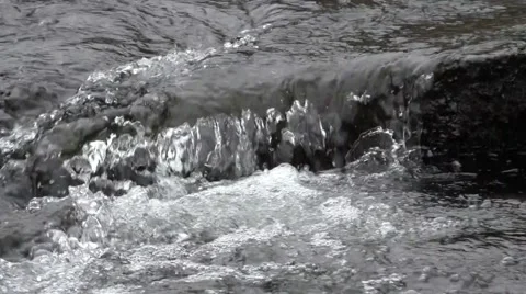 River flowing over rocks - close up Stock Footage 49639952