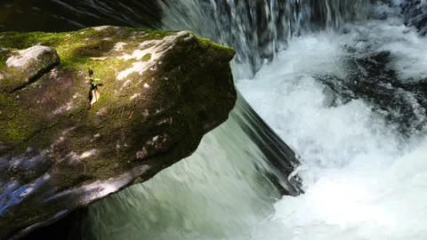 River flowing over rocks in slow motion 動画素材 275830950