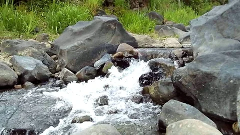 River flowing on small waterfall at the mountain 스톡 동영상 120277699