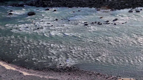 River Flowing Smoothly Over Rocks Stock Footage 41244725