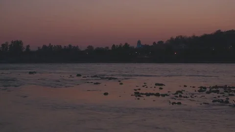River flowing at sunset Stock Footage 77452157