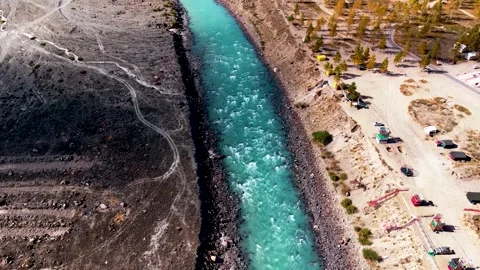 River Flowing Through a Deep Mountain Valley. Stock Footage 325763629