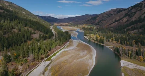 River Flowing Through Forested Mountain Valley Wyoming Stock Footage 333416752