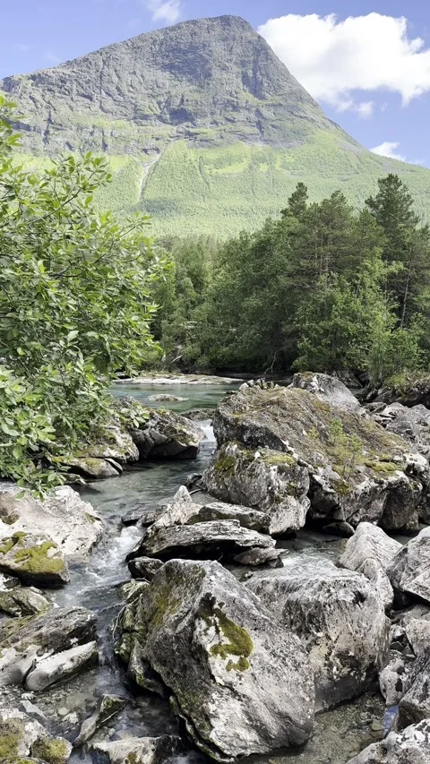 River flowing through giant boulders trollstigen 库存影片 340238158