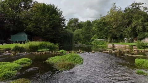 River flowing through green countryside in Durrow County Laois Ireland Stockbeeldmateriaal 333414963