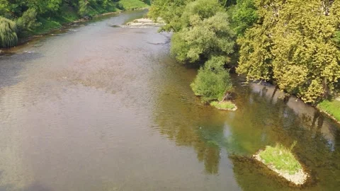 River flowing through green landscape in Bosnia aerial view Stock Footage 327070184