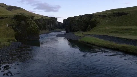 River flowing through green mountains Stock Footage 74906136