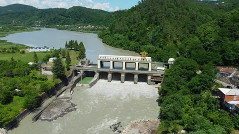 River flowing through hydroelectric dam montage Stock Footage 285651752