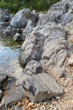 River flowing through large rocks in johnson shute ins Stock Photos