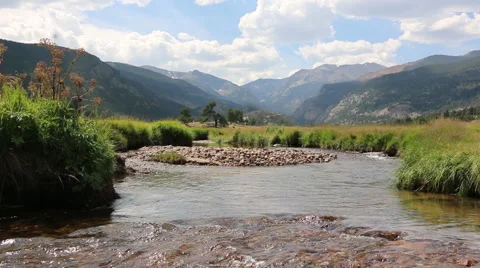 River Flowing Through Mountain Valley - Rocky Mountains, Nature Stock Footage 55306103