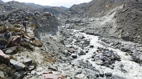 River flowing through the mountains Stock Footage 77450319