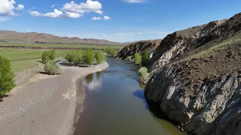 River Flowing Through the Plain Stock Footage 335263636