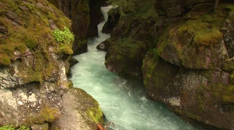 River flowing through rocks Stock Footage 61085064