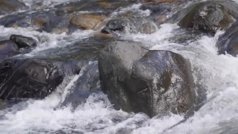 River Flowing Through Rocks Stock Footage 118547100