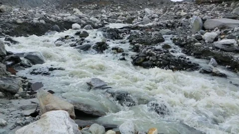 River flowing through the rocks on mountain slope Stock Footage 77450502