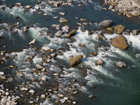 A river flowing through the rocks. Stock Photos