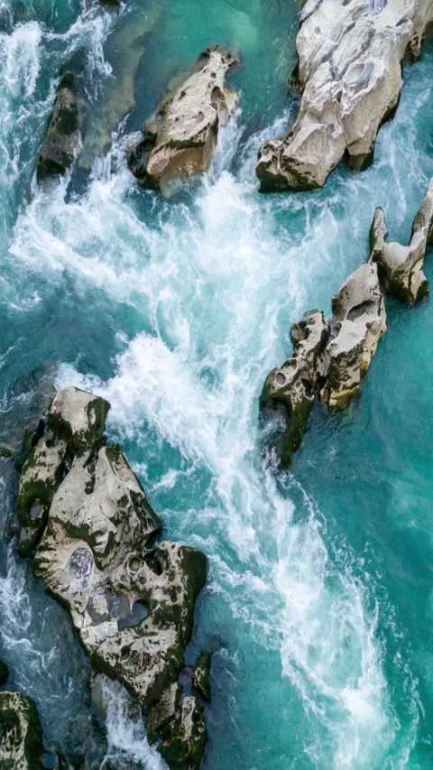 River flowing through rocks - stream making fresh water rapids and whitewater Stock Footage 270348285