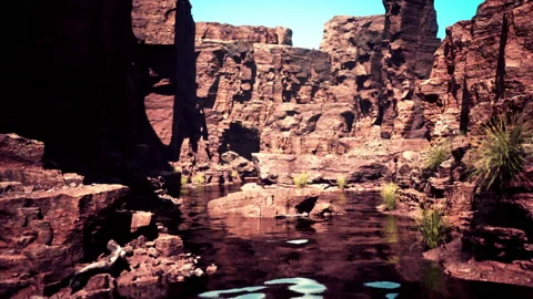 The river flowing through the valley of huge red rocks Video stock 233515851