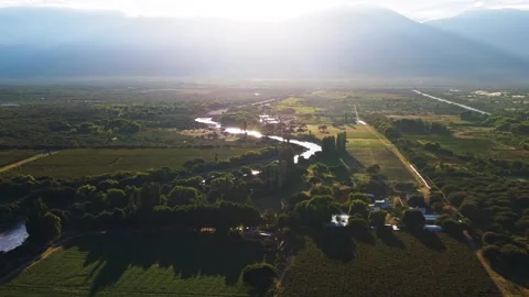 River Flowing Through Valley Near Cafayate Argentina Aerial Stock Footage 332229593