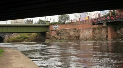 River Flowing Under Bridges HD Stock Footage 10688163