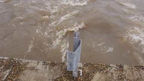River flowing under the damaged bridge Stock Footage 73949071