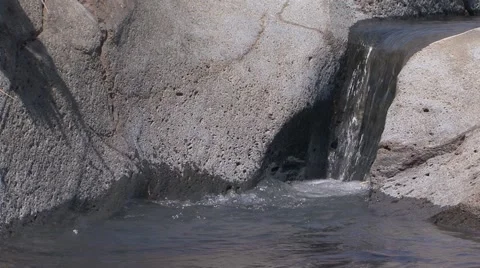 River flowing on volcanic rock Stock Footage 52053472