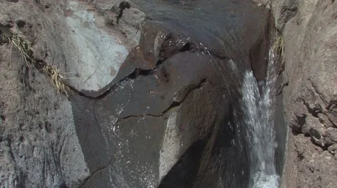 River flowing on volcanic rock Stock Footage 52057370