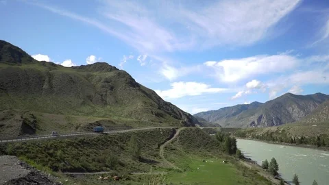 The river flows among the mountain scenery Stock Footage 119281014