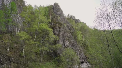 The river flows among the mountain scenery Video stock 235325216