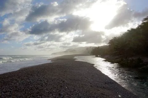 River flows to beach Stockfoto's