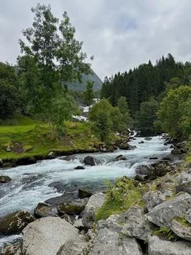 The river flows down from the Geiranger Mountains Stock Photos