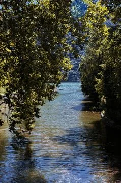 A river that flows into Lake Como. Stock Photos