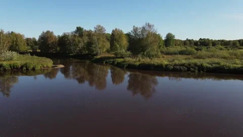 River flows to the lake in the taiga forest Siberia Stock Footage 302275248