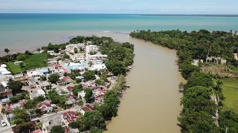 The river flows into the ocean1 Stock Footage 128036182