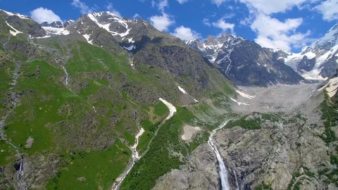 River flows out of the glacier from the mountain in Georgia Vidéo 94596080