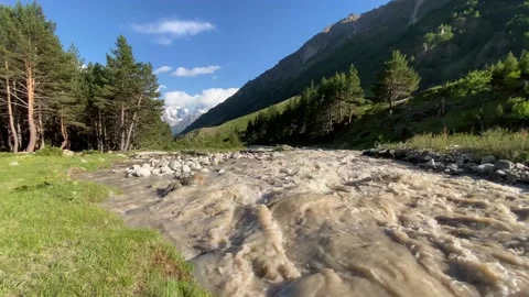 River flows through Caucasian mountains 스톡 동영상 133894452